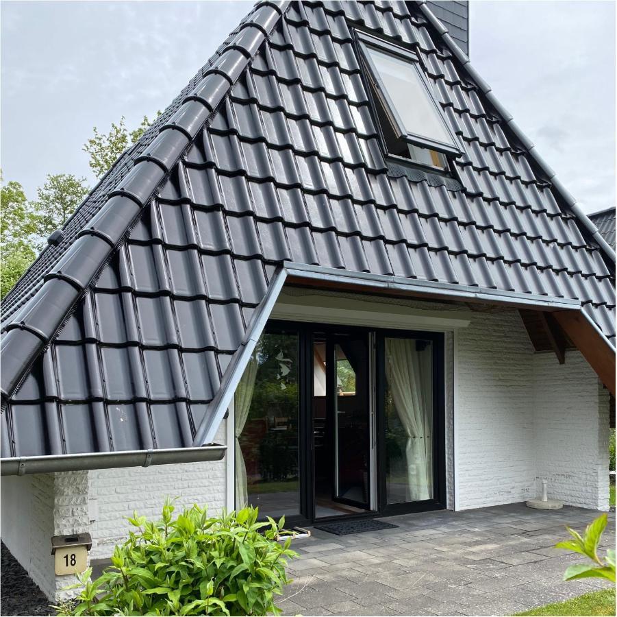 Ferienhaus Robbe Dorum Esterno foto