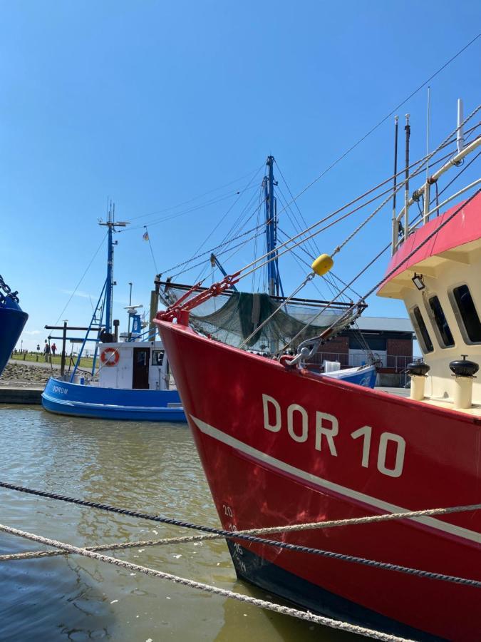 Ferienhaus Robbe Dorum Esterno foto